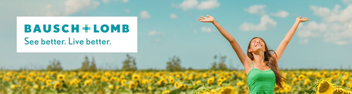 Woman in field with arms open