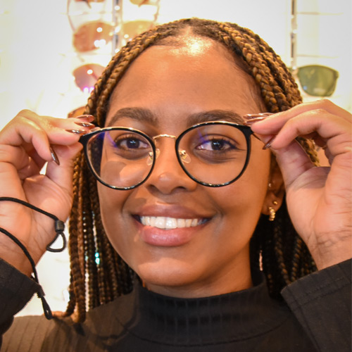 Smiling woman with new glasses